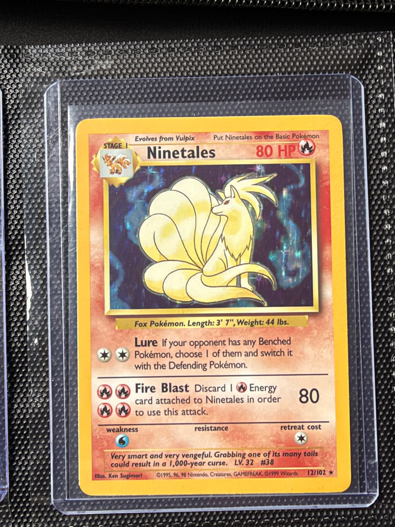 Base Set Ninetales 12/102, a holo with the foil inside the art box
