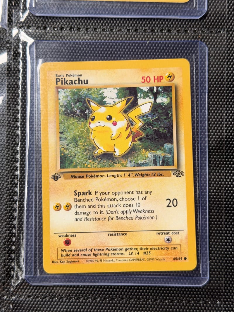 Jungle Pikachu 60/64 with the 1st Edition stamp at the lower left of the art box